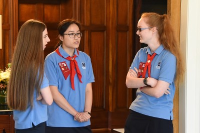 Image of  Girl Guides chatting before their award presentation 