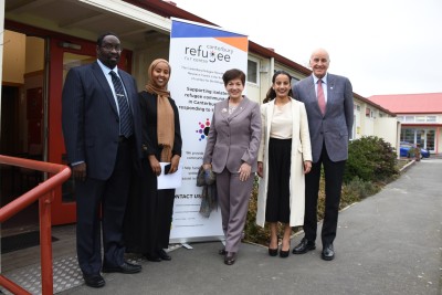 an image of Dame Patsy and Sir David with the managers of the Refugee Resource Centre