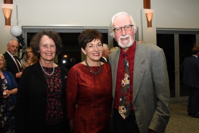 an image of Dame Patsy with Michael Perry, a descendant of the founder, Michael Wilding, and Jenny Perry