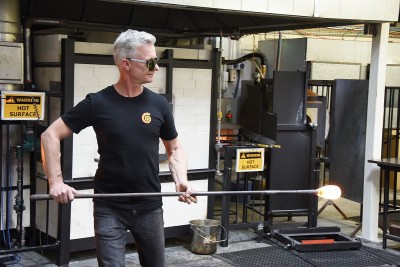 Image of Philip Stokes demonstrating glass blowing