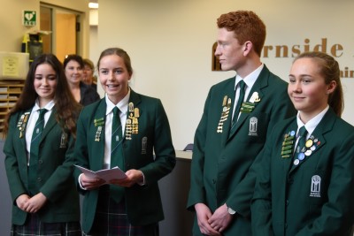 Image of Dame Patsy being welcomed by Burnside High School student leaders