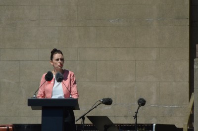 an image of Prime Minister Jacinda Adern delivering her address