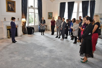 Image of Dame Patsy welcoming the Ministry for Women staff to Government House