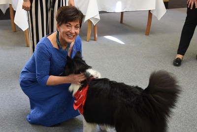 Image of Dame Patsy with Jack the Border Collie