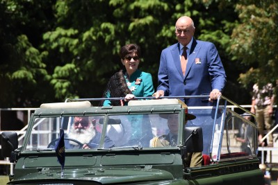 an image of Dame Patsy and Sir David arriving in the jeep used by HM Queen Elizabeth in 1953