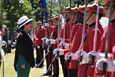 an image of Dame Patsy inspecting the officer cadets