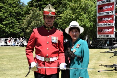 an image of Dame Patsy with Officer Cadet Anthony Hurndell, who received the Sword of Honour for achieving the highest marks