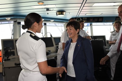 an image of Dame Patsy meeting a member of HMNZS Canterbury's crew