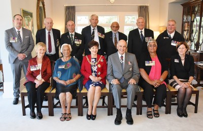 Images of recipients and representatives following the MID ceremony