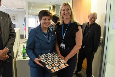 Image of Prof Merryn Tawhai presenting Dame Patsy with an art work