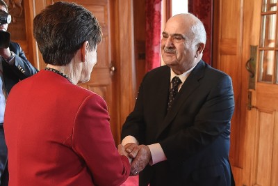 Image of Dame Patsy welcoming Prince Hassan