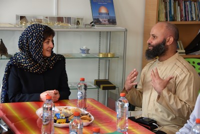 Image of Dame Patsy talking with Tahir Nawaz, President of the International Muslim Association of New Zealand 