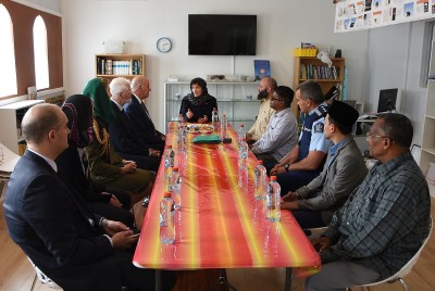Image of Dame Patsy talking with members of the Wellington Muslim community