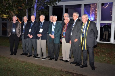 Old Boys from the 1930-1940 decade line up for a photo