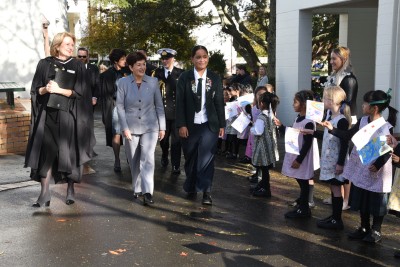 St Cuthberts students greeting Dame Patsy