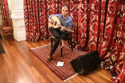 Image of Michael Alkouri playing the oud