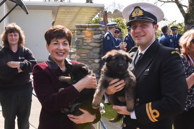 Image of Dame Patsy and ADC CAPT Dany Rassam with police dog puppies