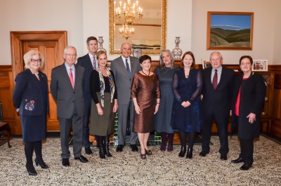 Image of Dame Patsy and Sir David with members of the board and staff