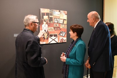 Image of Checking out an earlier photo of McCahon with Ron Brownson, Senior Curator, New Zealand and Pacific Art