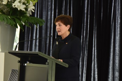 Image of Dame Patsy speaking before announcing the minute's silence