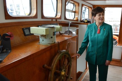 Image of Dame Patsy on the bridge of the 'Spirit of New Zealand'