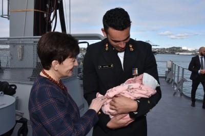 Image of Dame Patsy with a nine-day old baby
