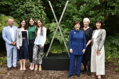 Dame Patsy with Dame Silvia Cartwright, Gill Gatfield and Gill's family standing by the Zealandia sculpture