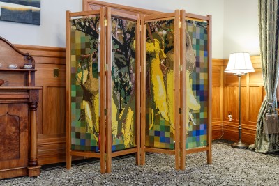 Image of the kowhai pattern tapestry screen in the Liverpool Room
