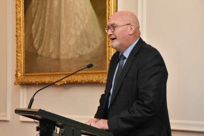 Colin Hardgrave speaking at a lectern