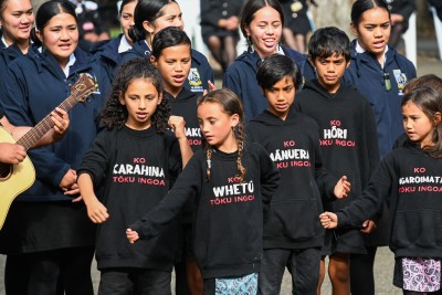 Schoolchildren performing waiata