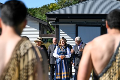 HE Ms Anne Riise facing the haka pōwhiri