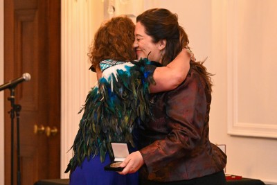 Dame Cindy embracing Professor Beverley Lawton, Director of Te Tātai Hauora o Hine