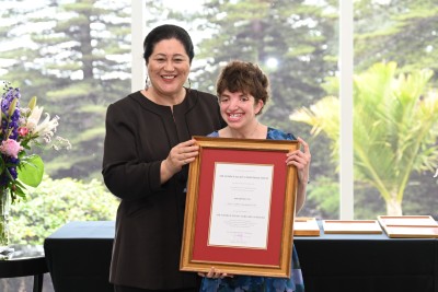 Dame Cindy presenting Kate Chandulal-Dee with her certificate