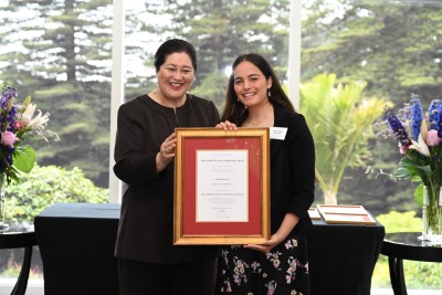 Dame Cindy presenting Shana Singh-Anderson with her certificate