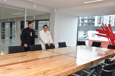 Rev Edridge showing Dame Cindy the Board Room, one of the bookable spaces for public use