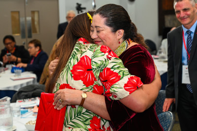 Dame Cindy embracing one of the attendees