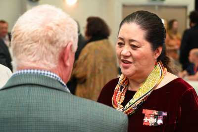 Dame Cindy in conversation with one of the attendees