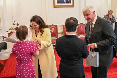 Dame Cindy and Dr Davies receiving gifts of thanks