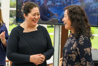 Dame Cindy in conversation with one of the volunteers in attendance