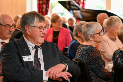 Bruce Avery listens to the speeches