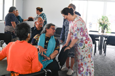 Dame Cindy greeting guests at the Community Lunch