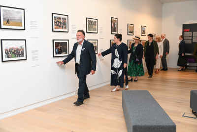 Dr Ruakere Hond leading Dame Cindy and guests on an initial tour of the exhibition space