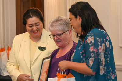 Dame Cindy, recipient Jo Duston, and The Honourable Karen Chhour, Minister for Children