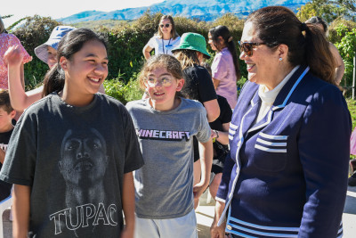 Dame Cindy meeting two of the children in attendance