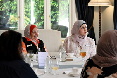 Faieza and Ala listening to the speeches