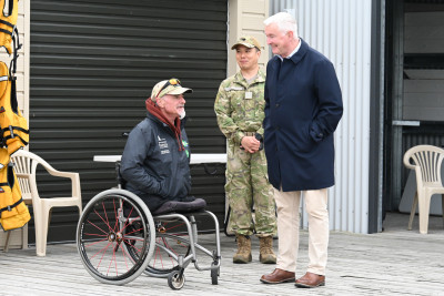 Dr Davies speaking with Sailability mentor Darrell Smith