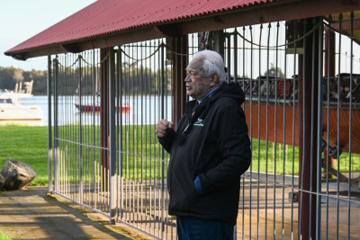 Joe Harawira stands by a replica of the waka Mātaatua