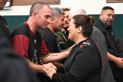 Dame Cindy meeting a guest attending the powhiri at Te Kura o te Paroa