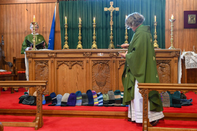 Reverend Cath Growcott blesses the beanies