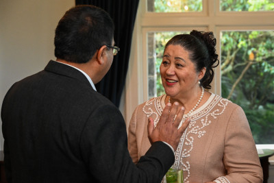 Dame Cindy in conversation with one of the attendees